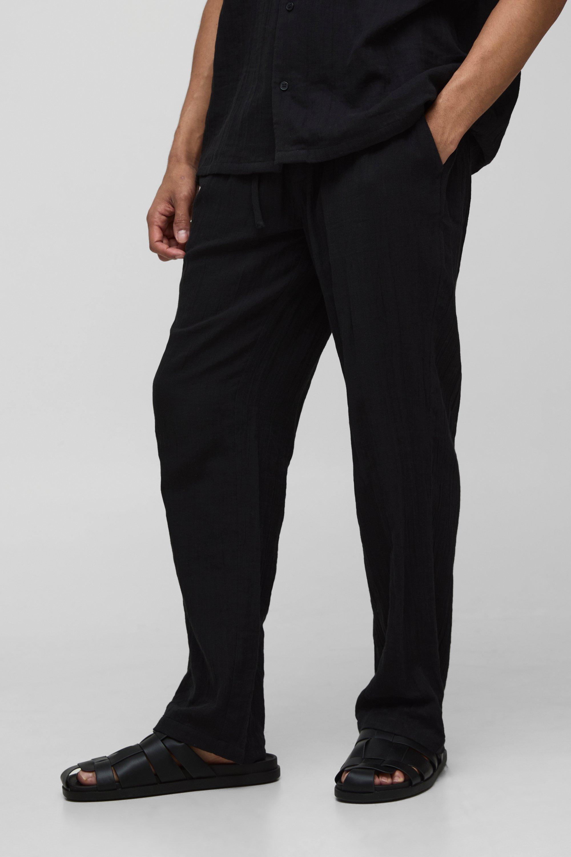Pantaloni dritti effetto crespo con vita elasticizzata, Nero