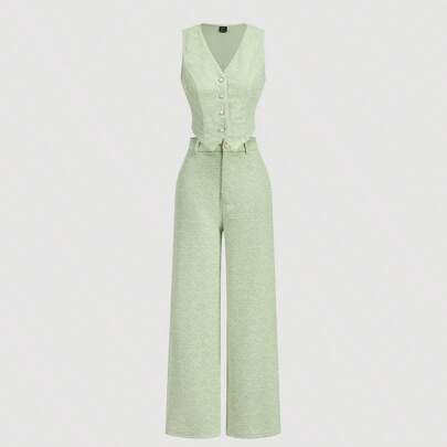 Completo elegante da donna composto da giacca verde e pantaloni dritti