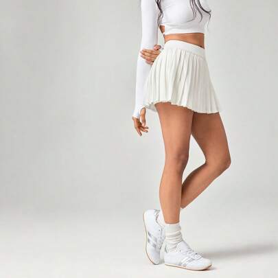 Minigonna plissettata con vita elastica e shorts incorporati, antisdrucciolo, adatta per tennis, golf, pickleball e uso casual quotidiano