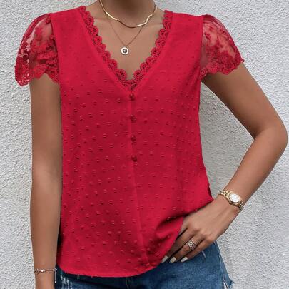 Blusa con pannello in pizzo guipure a pois per vestiti di Capodanno