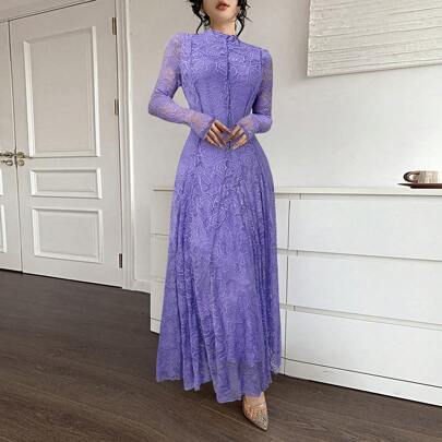 Elegante abito lungo in pizzo bianco per donna