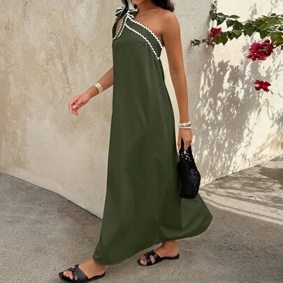 Vestito lungo e morbido da donna con volant ondulati