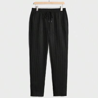 Pantaloni plissettati con vita in vita allargata e vita con laccetto, uomo
