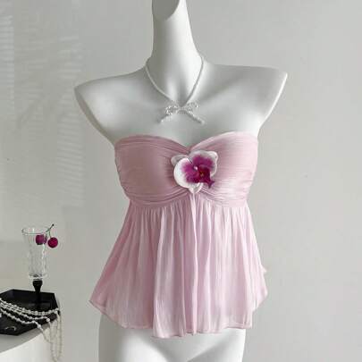 Elegante top sexy con pieghe in raso, motivo floreale delicato, design aderente sensuale, colore rosa cipria