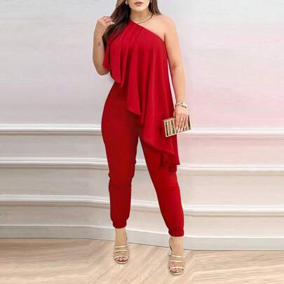 Tuta elegante aderente con spalla scoperta e volant, indumento sexy da festa, abito da sera, outfit da cerimonia per matrimoni o cocktail