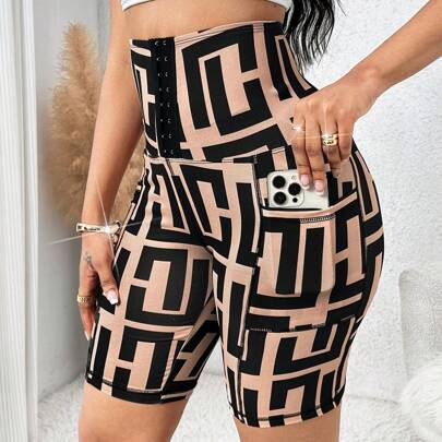 Pantaloni corti a leggings da donna plus size con stampa geometrica e design con bottoni, casual business per donna