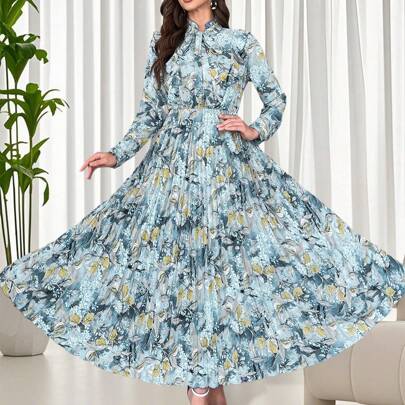 Elegante vestito plissettato da donna con stampa floreale completa