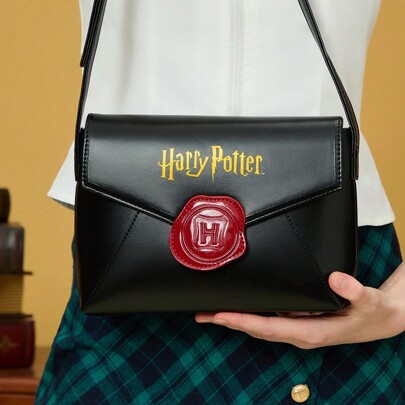 Borsa a spalla nera a busta, come regalo