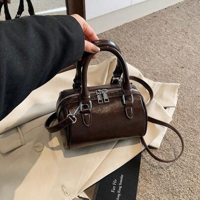 Borsetta vintage mini in pelle oleata di colore unito, a mano e a tracolla