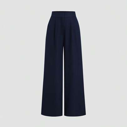 Pantaloni lunghi e larghi plissettati di tipo minimalista in blu navy