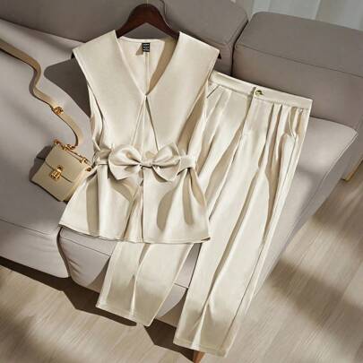 Set di top e pantaloni eleganti da donna con colletto a bavero