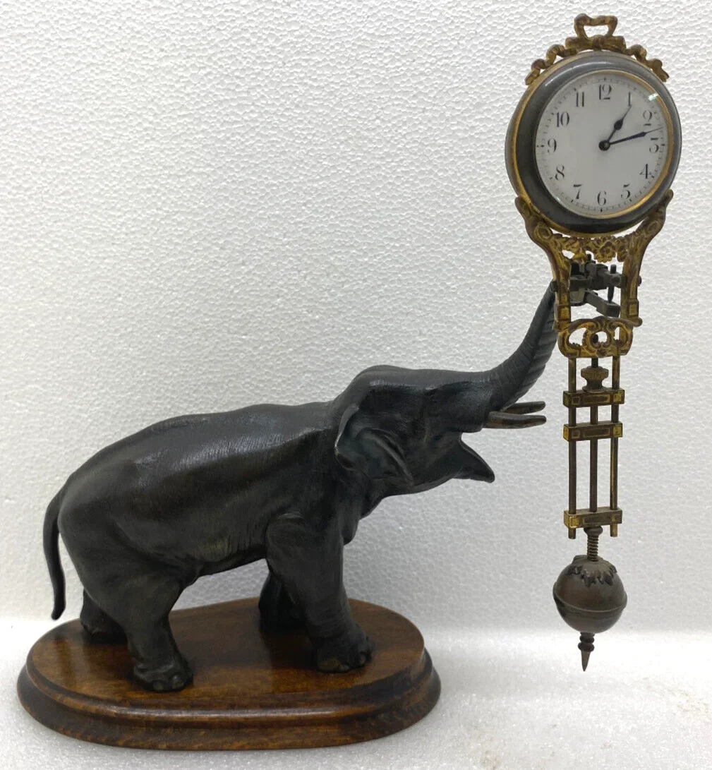 Antico Junghans Elephant Mystery Swinger Mantel Clock