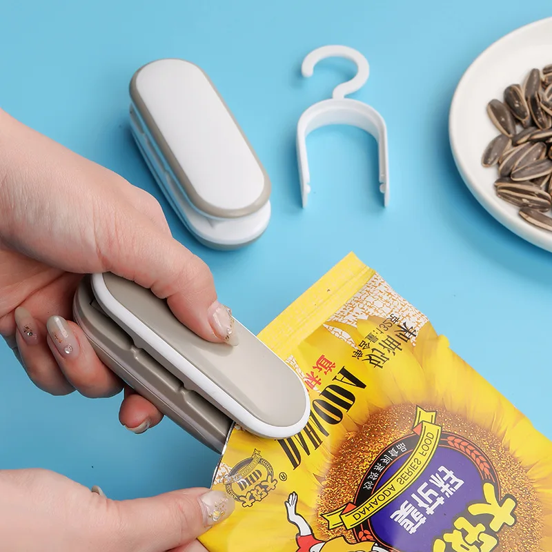 Sigillante Per Sacchetti Clip Sealing Mini Machine Packaging Heater Snack Sacchetti Di Plastica Per Celle Di Plastica Chiusura Per Alimenti Mollette P