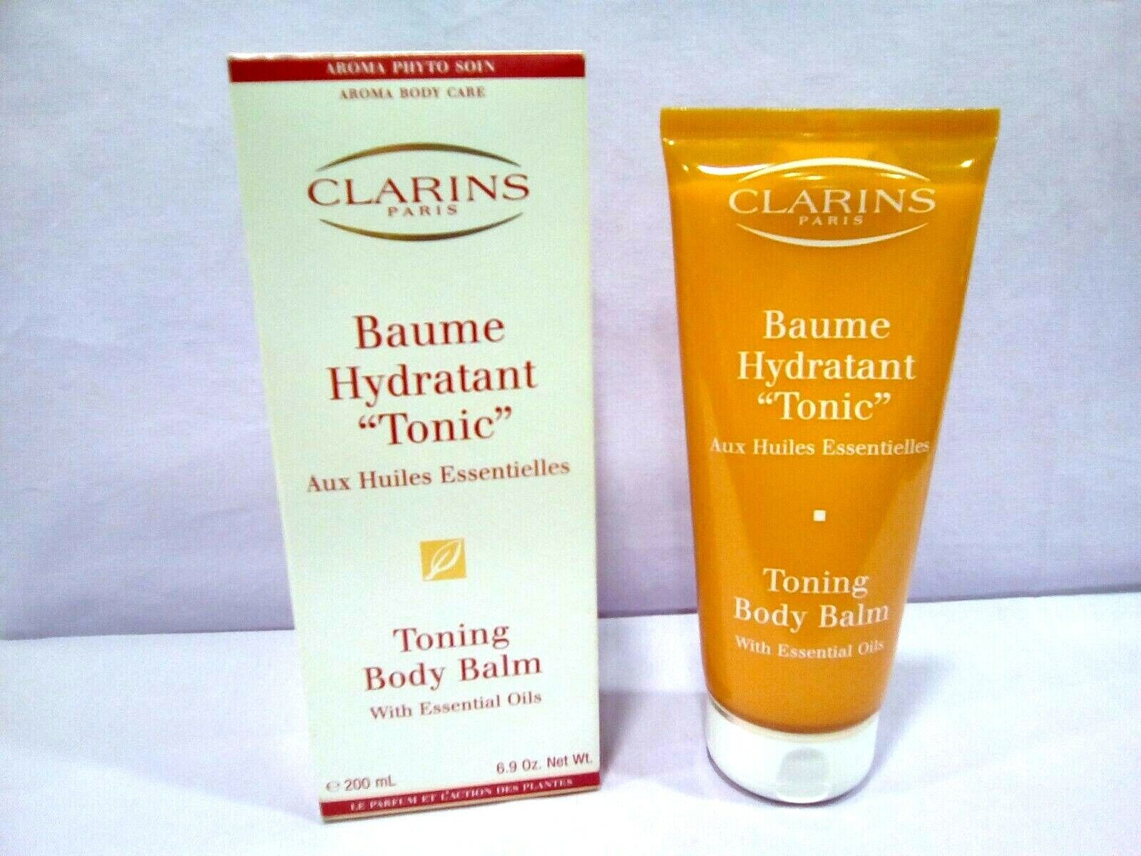 CLARINS BAUME HYDRATANT TONIC / TONING BODY BALM WITH ESSENTIAL OILS 200 ML.